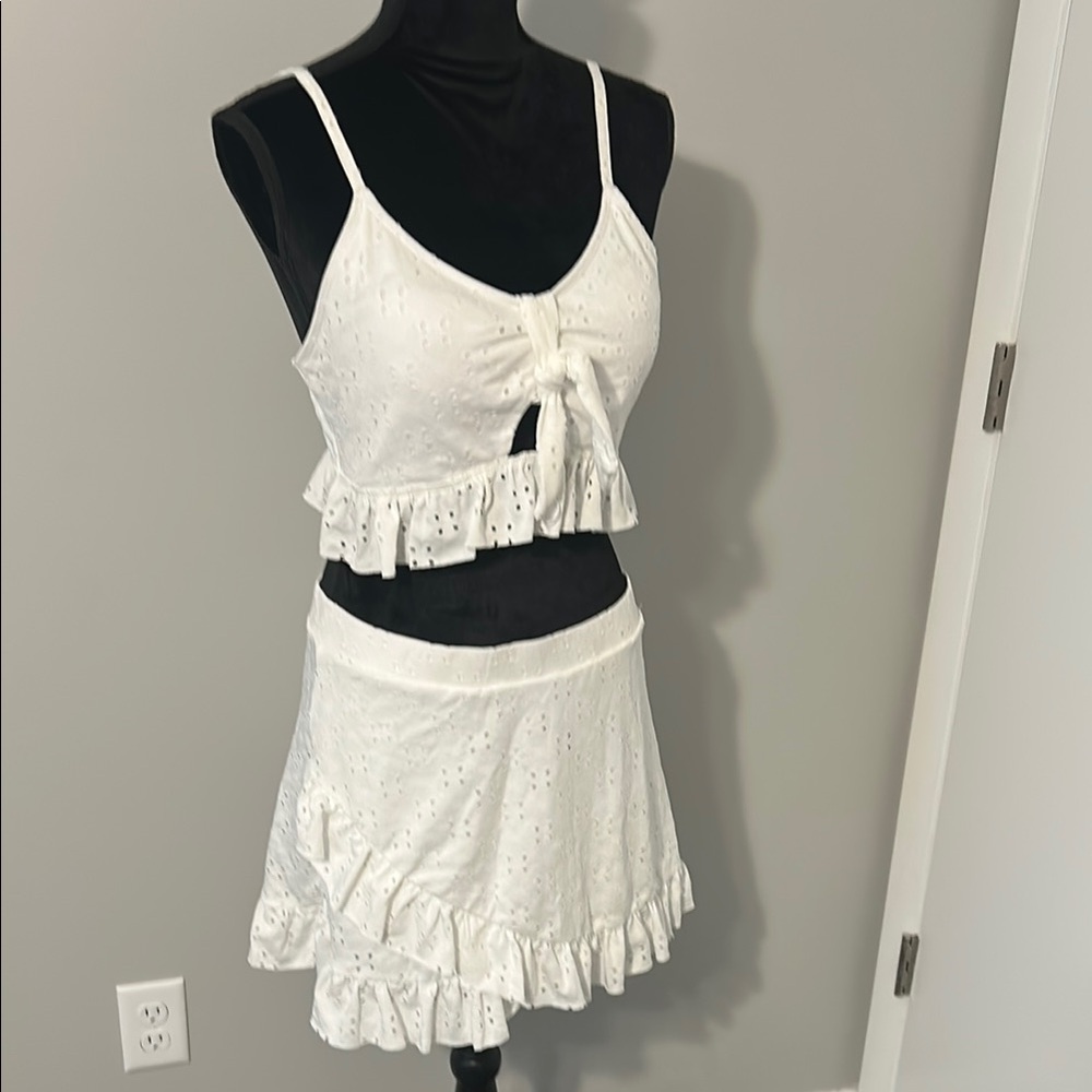 White eyelet bathing suite with skirt